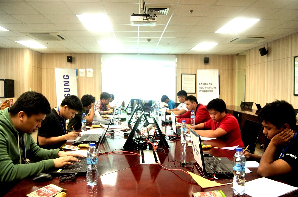 Many are participating in an event in a meeting room. 